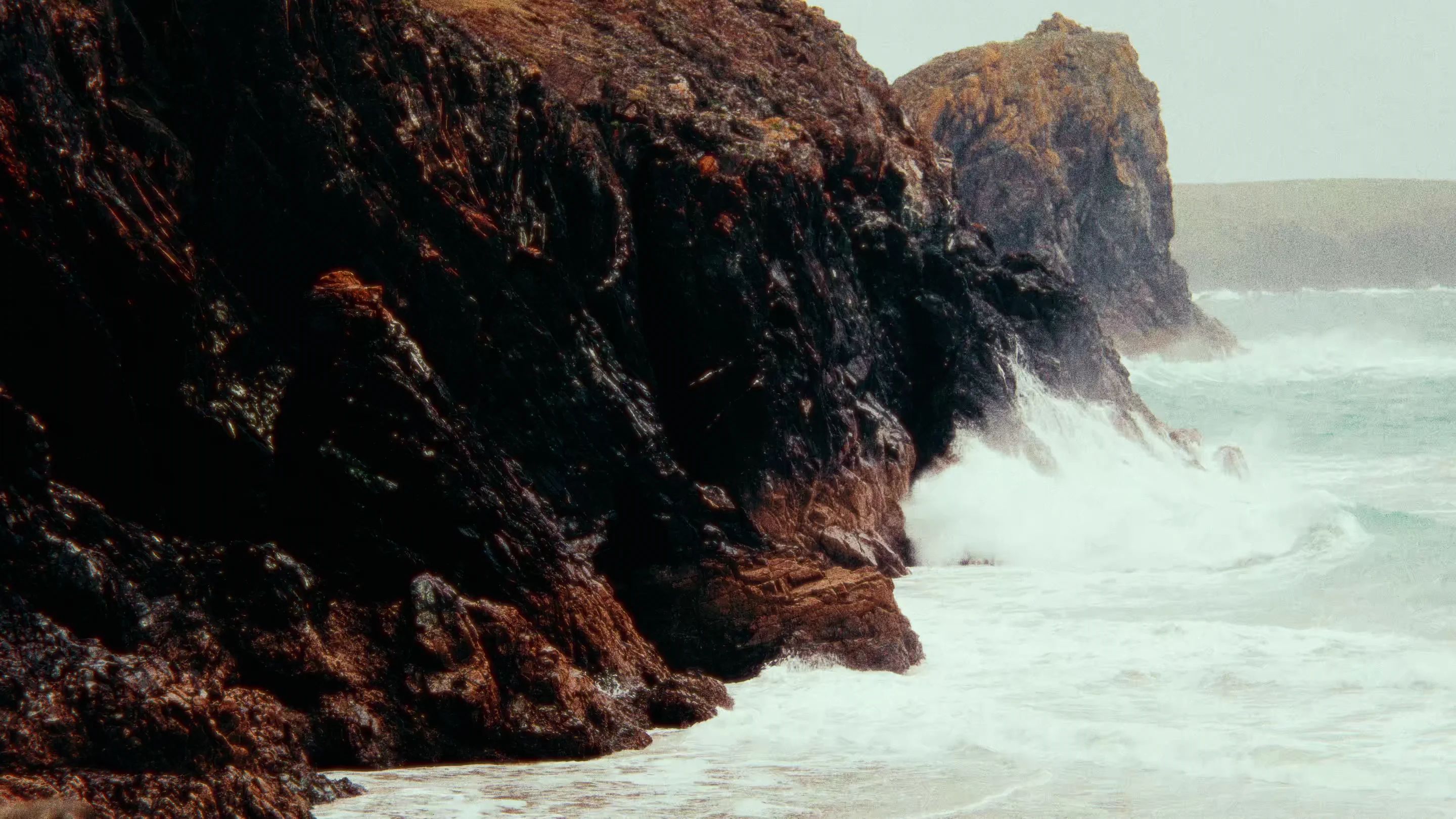 Atlantic waves breaking against the cliffs of the Cornish coast